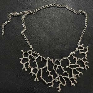 Silver branch statement necklace